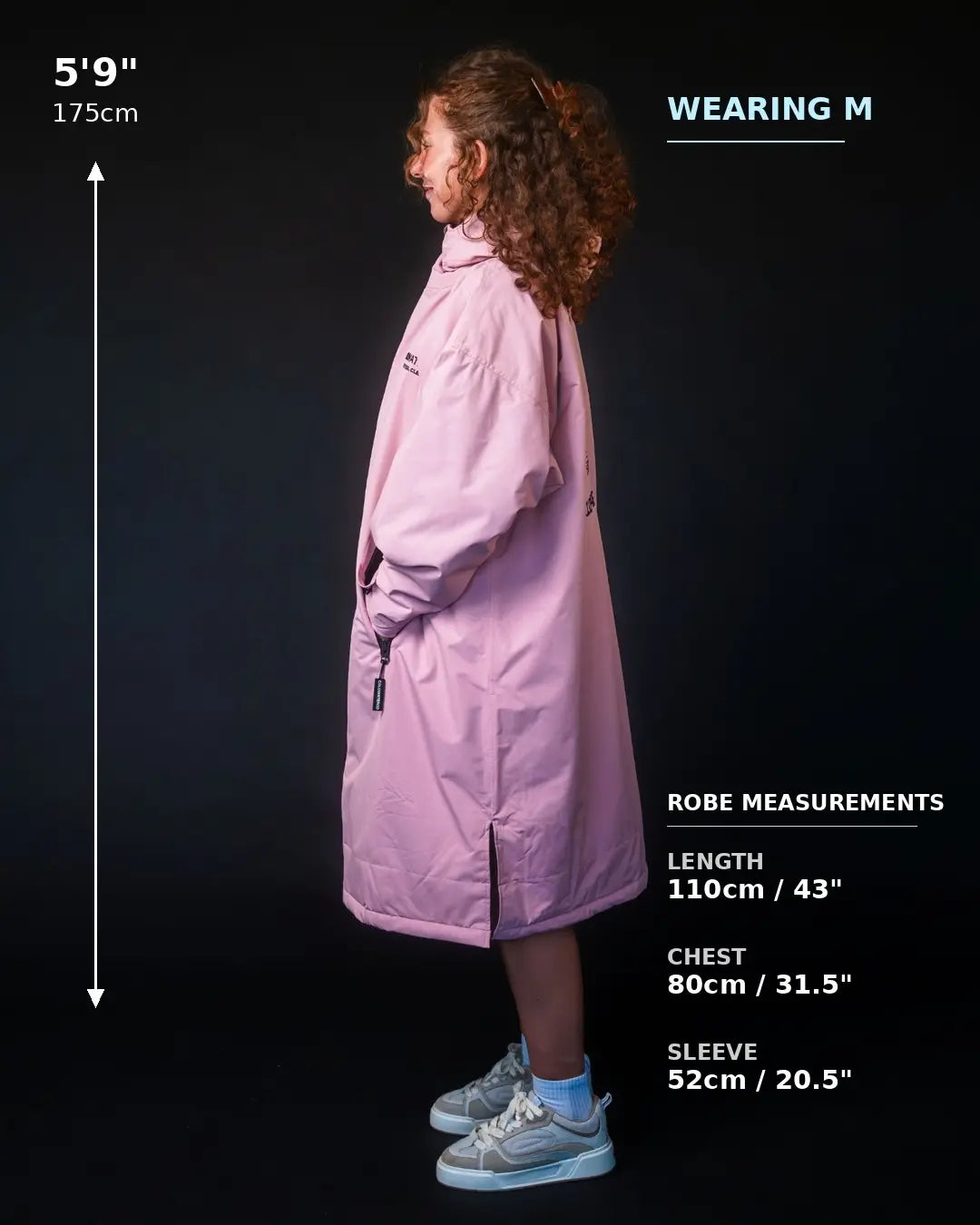 A model wearing a light pink hooded COLDWATERCO robe is shown in profile against a black background, with measurement annotations indicating a height of 5'9" (175cm) and robe measurements including length, chest, and sleeve.