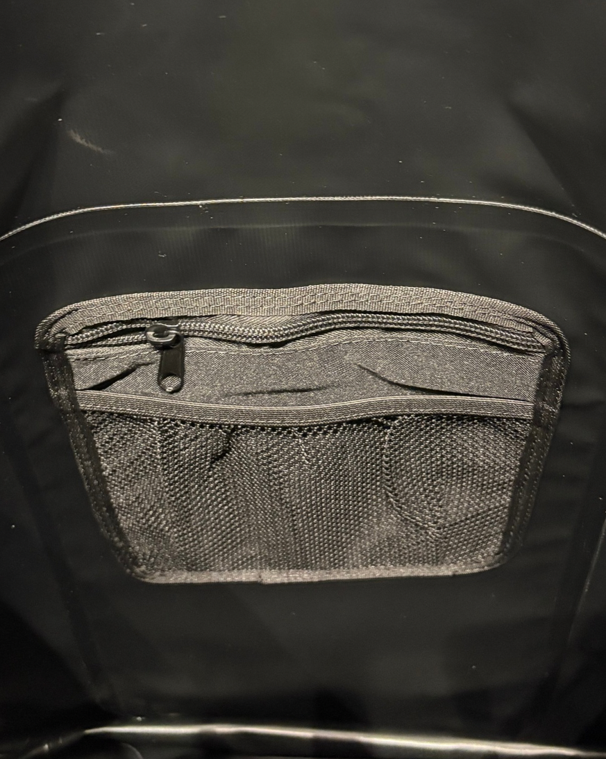Black waterproof backpack inside pocket view