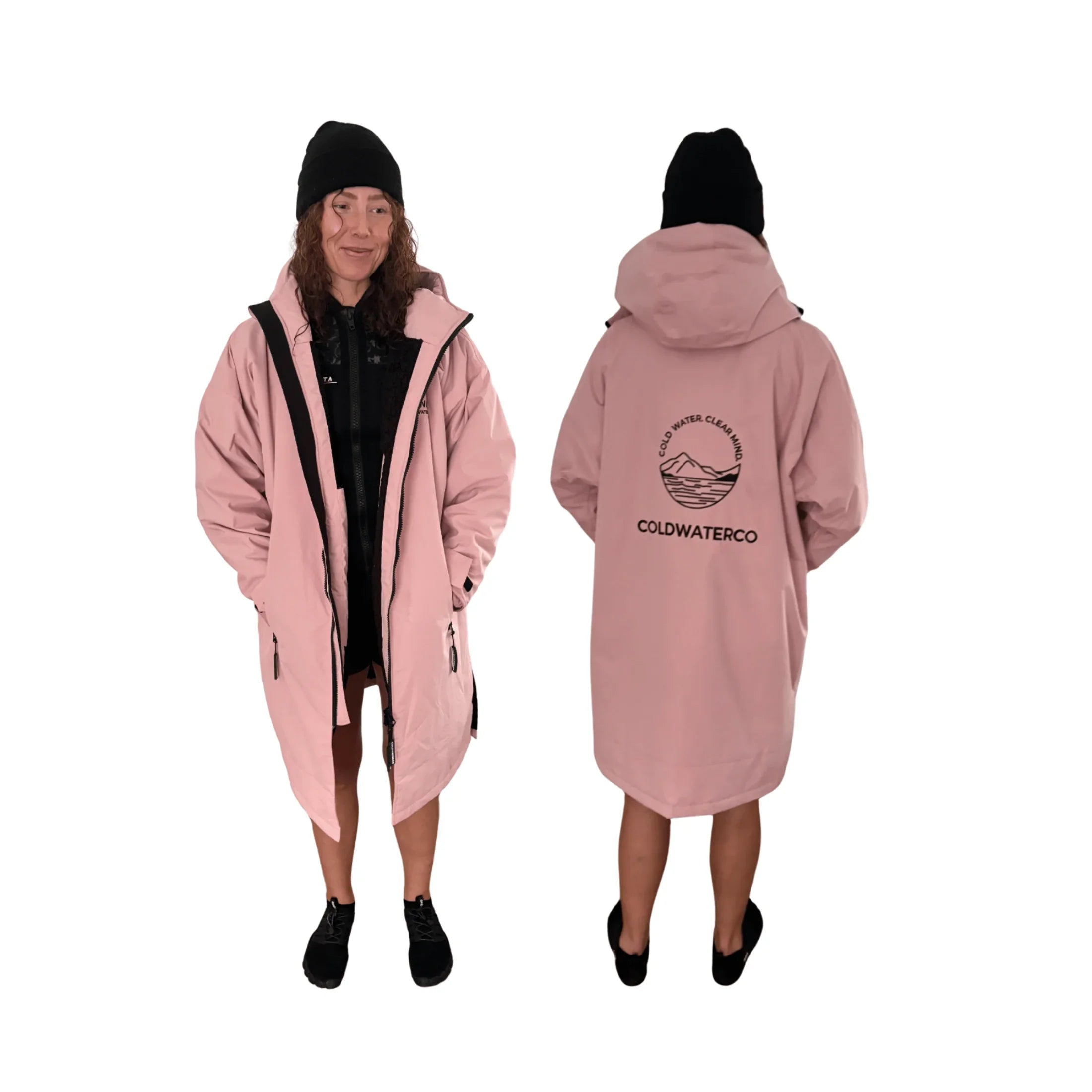 Woman in pink changing robe against white background