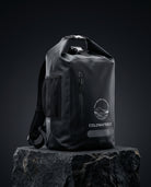 Black backpack with a visible brand logo on a dark background