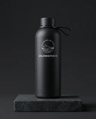 Black water bottle with 'COLDWATERCO' logo on a dark background